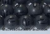 CAA3661 15.5 inches 8mm round matte & carved black agate beads