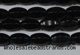 CAG6029 15.5 inches 6*10mm faceted rice matte black agate beads