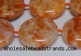 CCA477 15.5 inches 25mm flat round orange calcite gemstone beads