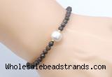 CFB830 4mm faceted round bronzite & potato white freshwater pearl bracelet