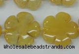 CFG458 15.5 inches 24mm carved flower yellow jade beads