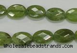 CGA101 15.5 inches 10*14mm faceted oval natural green garnet beads