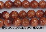 CGS471 15.5 inches 6mm faceted round goldstone beads wholesale