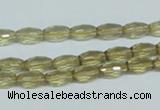 CLQ10 15.5 inches 6*10mm faceted rice natural lemon quartz beads