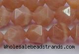 CMS1134 15.5 inches 12mm faceted nuggets peach moonstone beads
