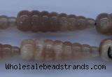 CMS138 15.5 inches 10*35mm carved teardrop natural moonstone beads
