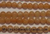 CMS701 15.5 inches 6mm round peach moonstone beads wholesale