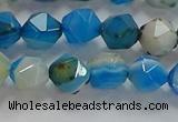 CNG6524 15.5 inches 6mm faceted nuggets line agate beads