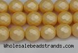 CSB1821 15.5 inches 6mm faceetd round matte shell pearl beads